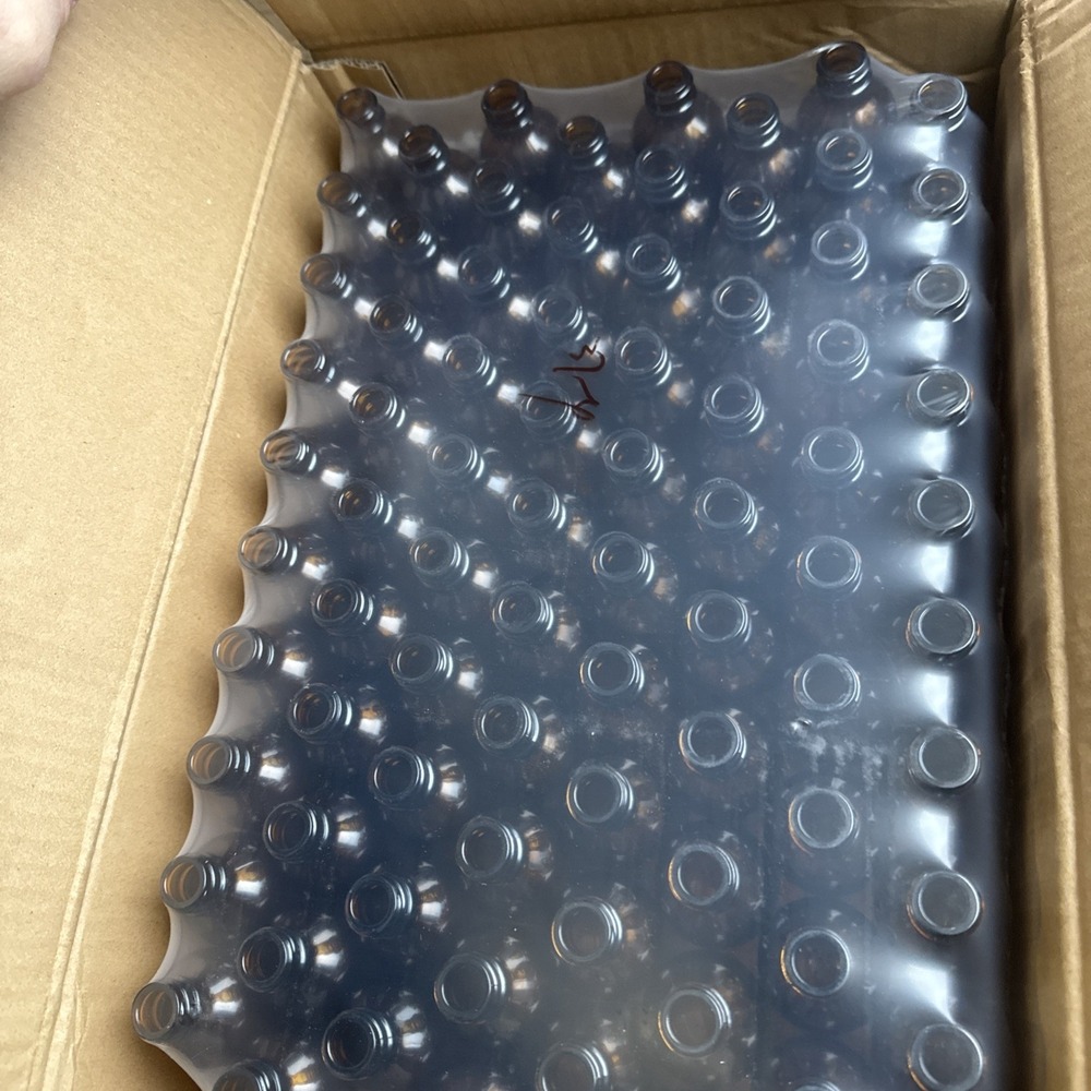 (Case of 240) Amber Boston Round Glass Bottles - 2 oz **Caps not included**